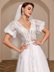 Elegant Pearl Embellished Pleated Mesh Lantern Sleeve Ball Gown Wedding Dress With Dramatic Train