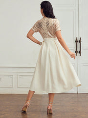 CONTRAST SEQUIN FLARE HEM DRESS