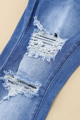 Distressed Flare Leg Jeans with Pockets - Shah S. Sahota