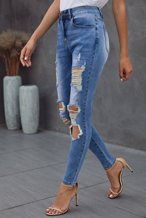 Medium Wash Distressed Skinny Jeans - Shah S. Sahota
