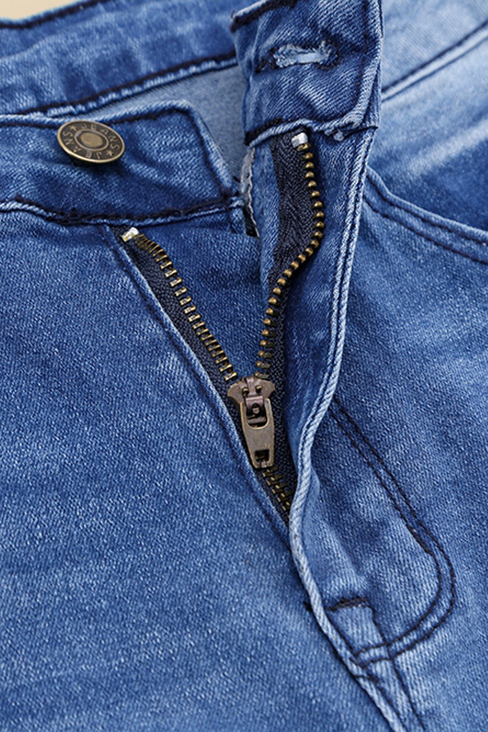 Distressed Flare Leg Jeans with Pockets - Shah S. Sahota