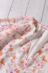 Floral V-Neck Curved Hem Blouse - Shah S. Sahota