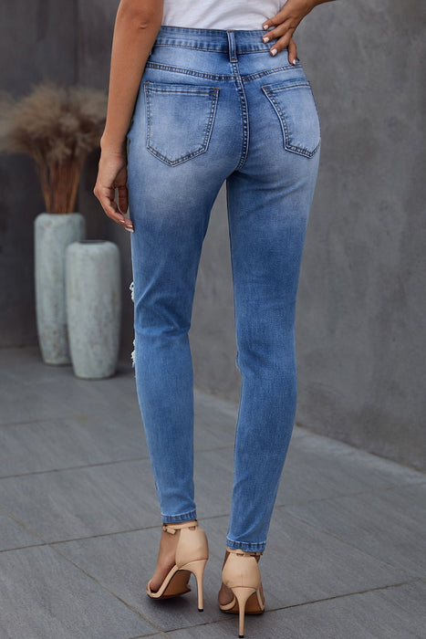 Medium Wash Distressed Skinny Jeans - Shah S. Sahota